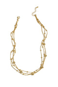 Layered necklace with polka dots