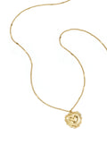 Necklace with flat details and large pendant