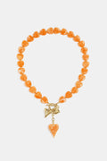 Bead necklace with hanging heart charms